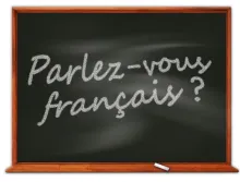 on the blackboard it is written parle vous francais? meaning can u speak french?